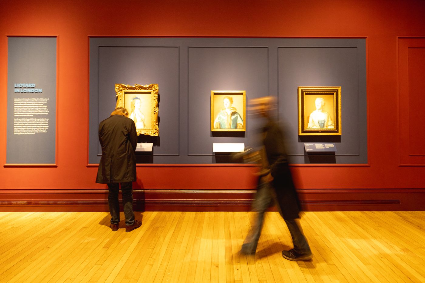 Portraits, and the people looking at them.