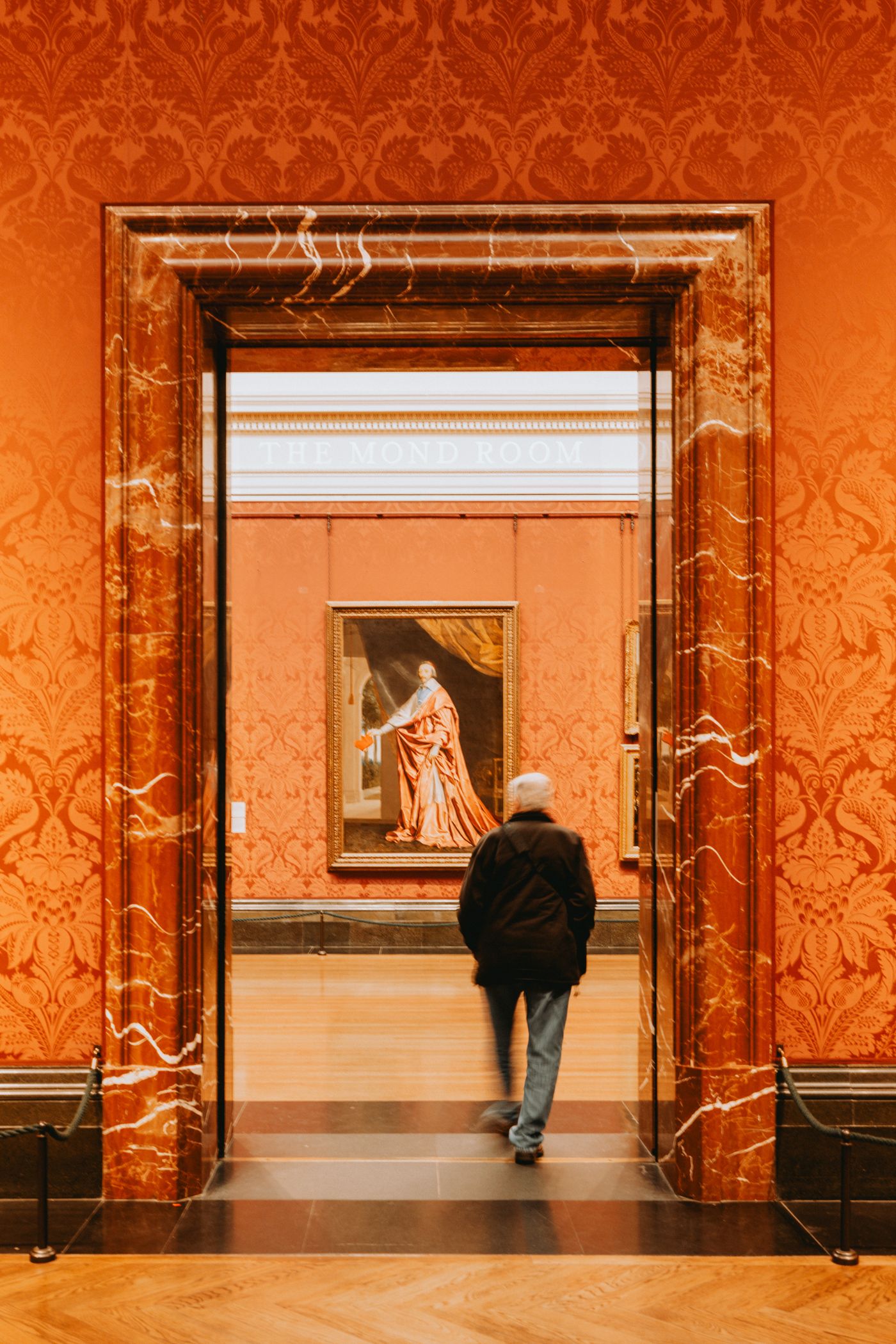 Through the doorway.
