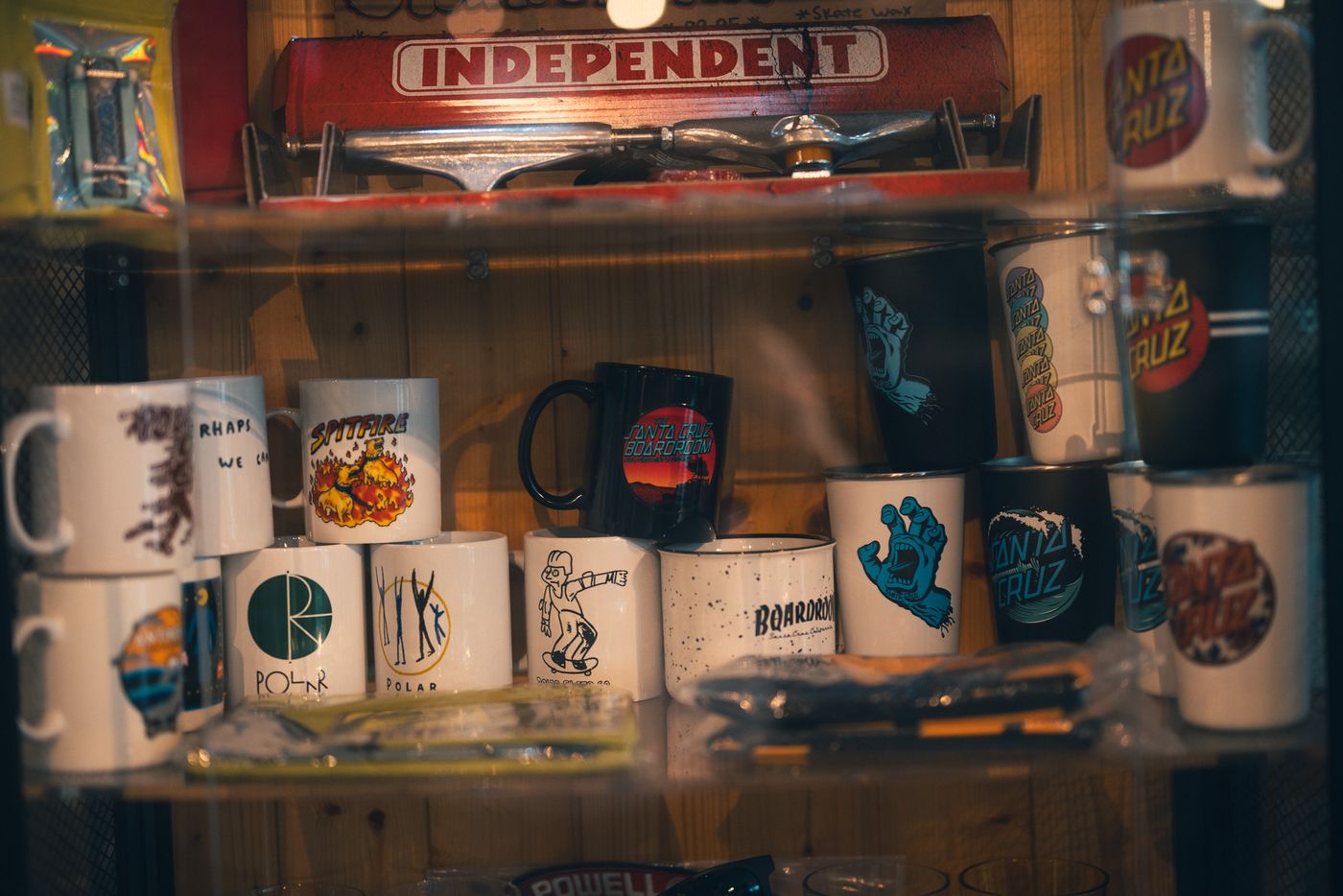 Mugs on the shelf.