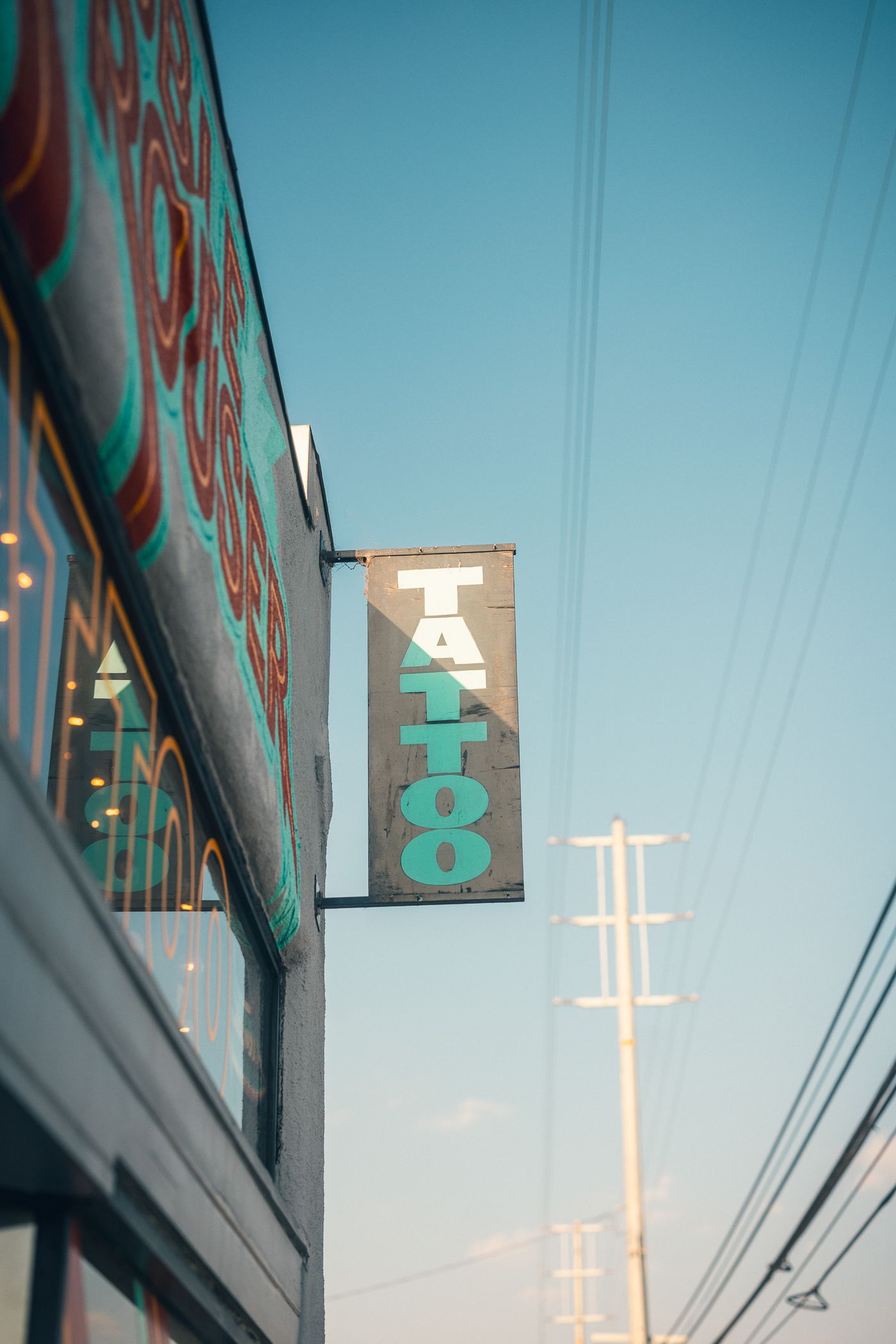 空に向かうTATTOO。